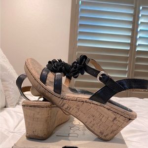 Born concept black leather straps cork wedges with flower design sandals.